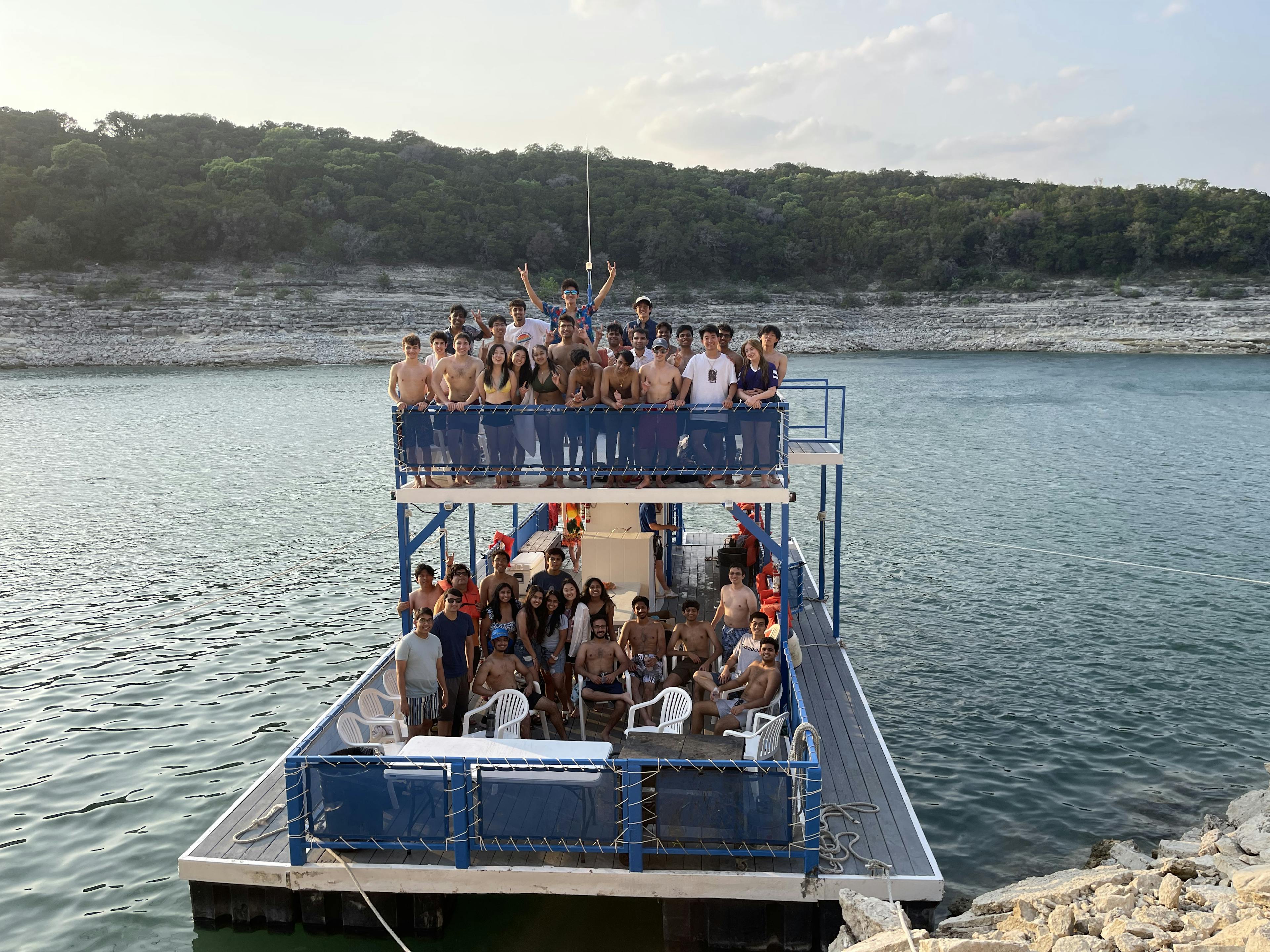 Group photo if IEEE members on a 2 story boat.